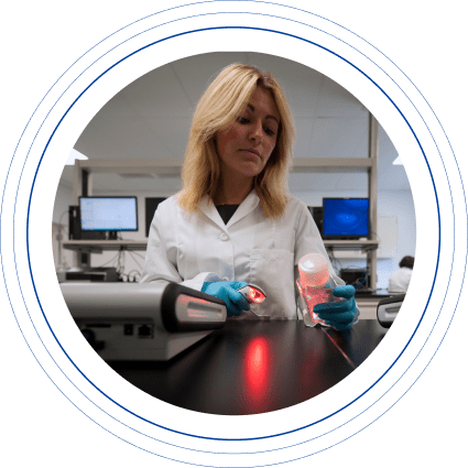 A female laboratory professional working in a state-of-the-art Charles River laboratory.