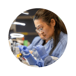 A female Charles River scientist working with laboratory samples