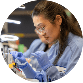 A female Charles River scientist working with laboratory samples