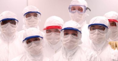 A group of Charles River laboratory employees in cleanroom suits