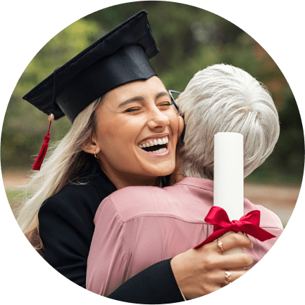A young, female intern at Charles River Labs graduating college holding her diploma and hugging her mother